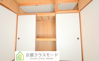 押入