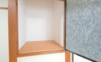 押入